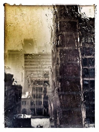 Rain in downtown Los Angeles, photographed by Alexis Rhone Fancher