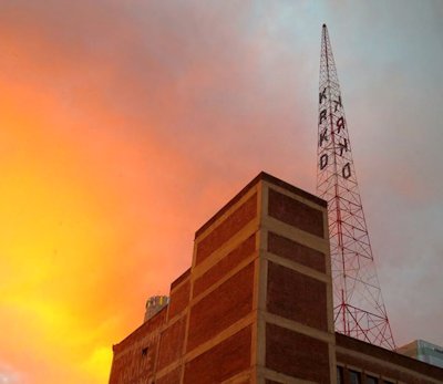 Radio Tower at Sunset, photographed by Alexis Rhone Fancher