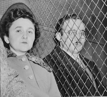 Photograph by Roger Higgins: Julius and Ethel Rosenberg, separated by heavy wire screen as they leave U.S. Court House after being found guilty by jury